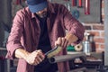 Man doing metalwork in a workshop Royalty Free Stock Photo