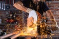 Man doing metalwork in a workshop Royalty Free Stock Photo