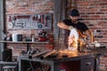 Man doing metalwork in a workshop Royalty Free Stock Photo