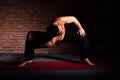 Man doing Parivritta Stambhasana Royalty Free Stock Photo