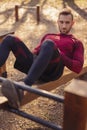 Man doing plank while working out outdoors Royalty Free Stock Photo