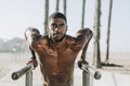 Man doing push ups on bars Royalty Free Stock Photo