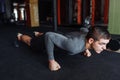 A man doing push-UPS in the gym, sports, push-UPS on weights Royalty Free Stock Photo