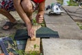 Man doing repairs in the country Royalty Free Stock Photo