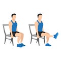 Man doing seated chair leg extensions Royalty Free Stock Photo