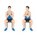 Man doing seated gluteal and lumbar rotation or chair twist exercise