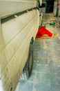 A man inspecting the car for regular service at the service station