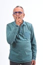 Man doing in silent silence with fingers