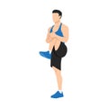 Man doing standing knee hugs exercise