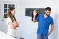 Man doing stop gesture to wife while arguing Royalty Free Stock Photo