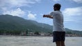 man doing Surya Namaskar in the Ganges