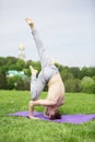 Man doing yoga exercises in the park Royalty Free Stock Photo