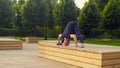 A man doing yoga exercises in the park Royalty Free Stock Photo
