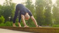 A man doing yoga exercises in the park Royalty Free Stock Photo