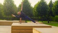 A man doing yoga exercises in the park Royalty Free Stock Photo