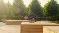 A man doing yoga exercises in the park Royalty Free Stock Photo