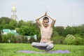 Man doing yoga in nature