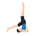 Man doing yoga shoulder stand pose. using hands push back and lift the legs up