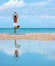 Man Doing Yoga. Vrikshasana Pose (The Tree)