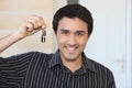 Man with a doorkey Royalty Free Stock Photo
