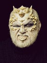 Man with dragon skin and beard Royalty Free Stock Photo