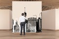 Man drawing in art gallery wooden floor, ceiling