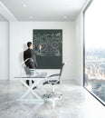 Man drawing business chart in office Royalty Free Stock Photo