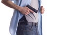 Man drawing concealed carry pistol