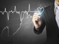 Man drawing heart and chart heartbeat Royalty Free Stock Photo