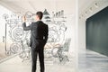 Man draws business plan on a glass partition in the meeting room Royalty Free Stock Photo