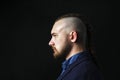 Man with dreadlocks, looks like a viking, Iroquois haircut Royalty Free Stock Photo