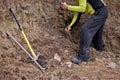 Man digging a hole with a shovel for the project Royalty Free Stock Photo