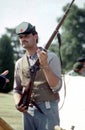 Man dressed a civil war soldier with musket in reenactment