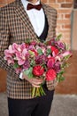 Man Dressed Fashion Suit Holding Bouquet of Flower Royalty Free Stock Photo