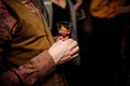 Man holding a cocktail glass with fresh summer drink Royalty Free Stock Photo