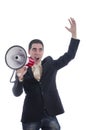 Man dressed in suit shouting with flushed face through megaphone. Royalty Free Stock Photo