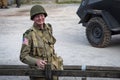 Man dressed in wartime US army soldiers uniform reenacting military maneuvers during Victory Day Europe Celebration Event