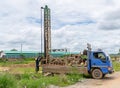 Man drilling insert Tube Artesian Water