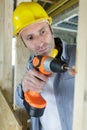 man drilling wood with battery power Royalty Free Stock Photo
