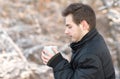 Man drink hot tea in the nature Royalty Free Stock Photo