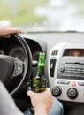 Man drinking alcohol while driving the car Royalty Free Stock Photo
