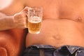 man drinking beer with beer belly Royalty Free Stock Photo