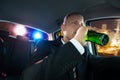 Man drinking beer chased by police