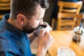 Man Drinking Coffee At Cafe Royalty Free Stock Photo