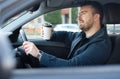 Portrait of man drinking coffee while driving car Royalty Free Stock Photo