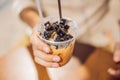 Man drinking cold bubble tea in cafe Royalty Free Stock Photo