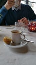 Man drinking expresso coffee in restaurant