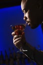 Man drinking martini. Royalty Free Stock Photo