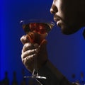 Man drinking martini. Royalty Free Stock Photo