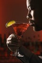 Man drinking martini. Royalty Free Stock Photo